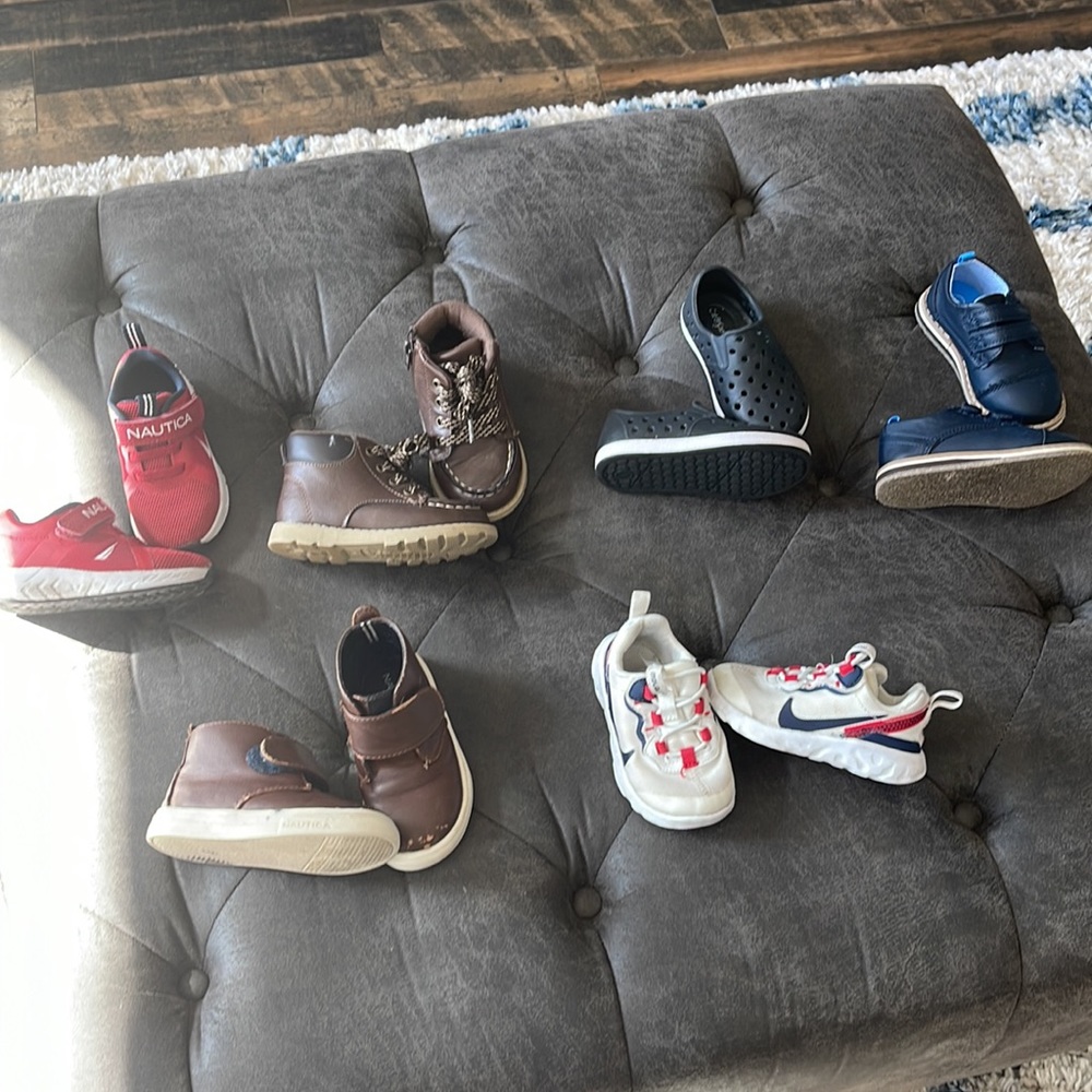 Lot of toddler shoes brands Nike, Jordan, Puma, Nautica, and Cat & Jack.